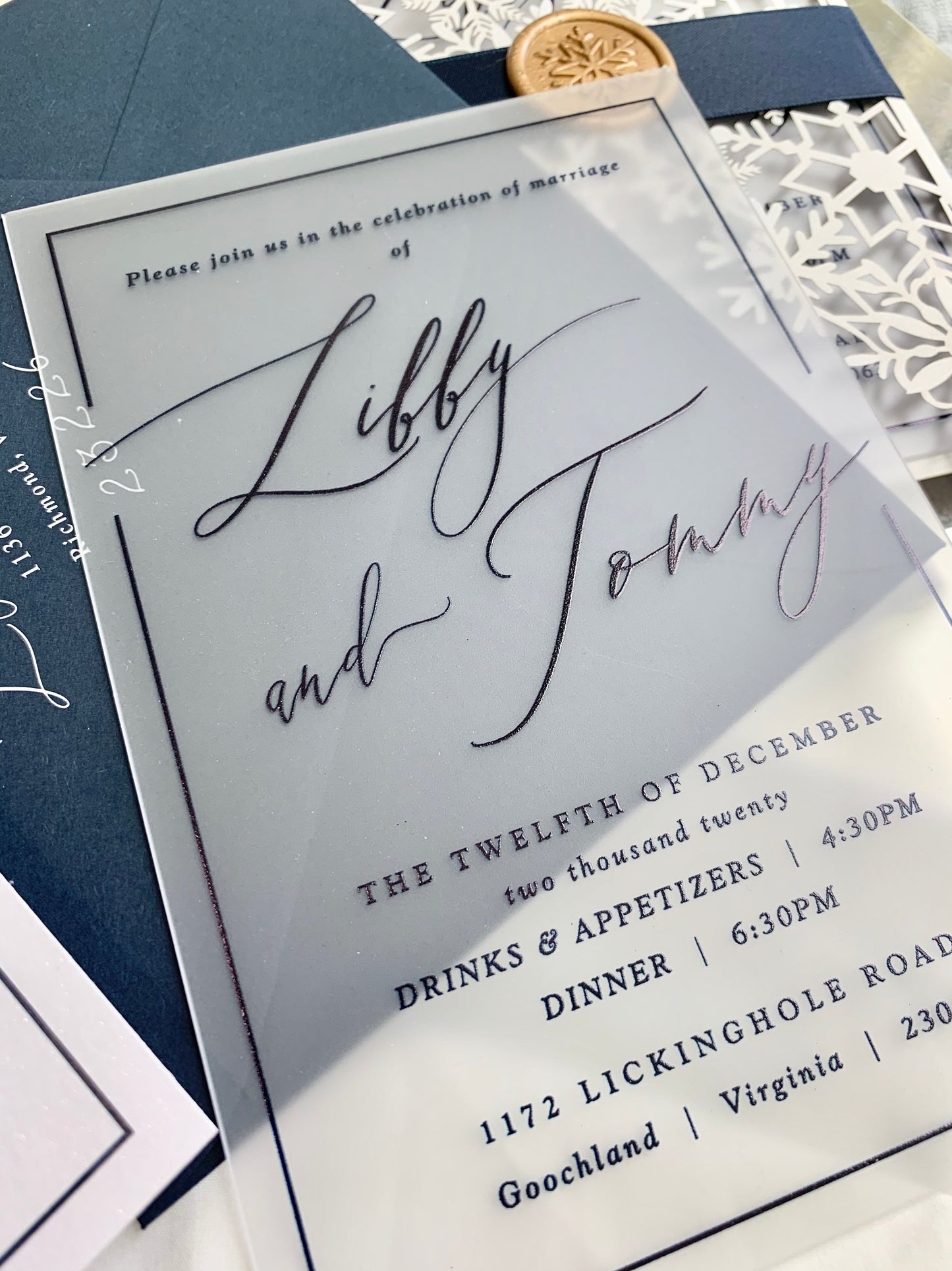 a close up of a wedding card on a table