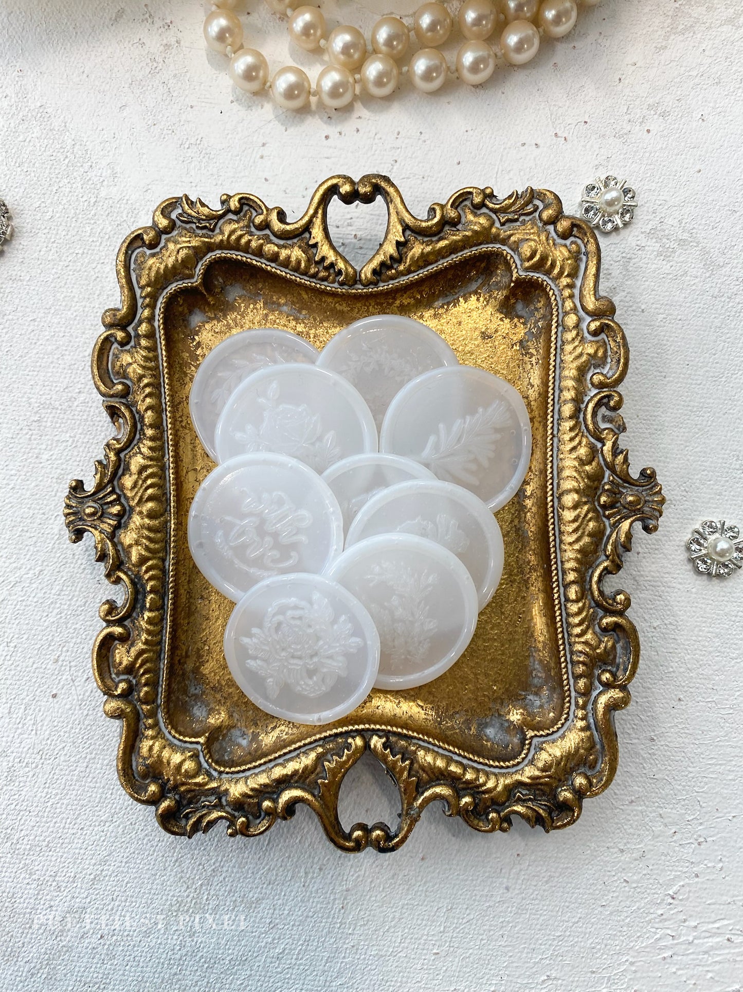 a close up of a plate with buttons on it