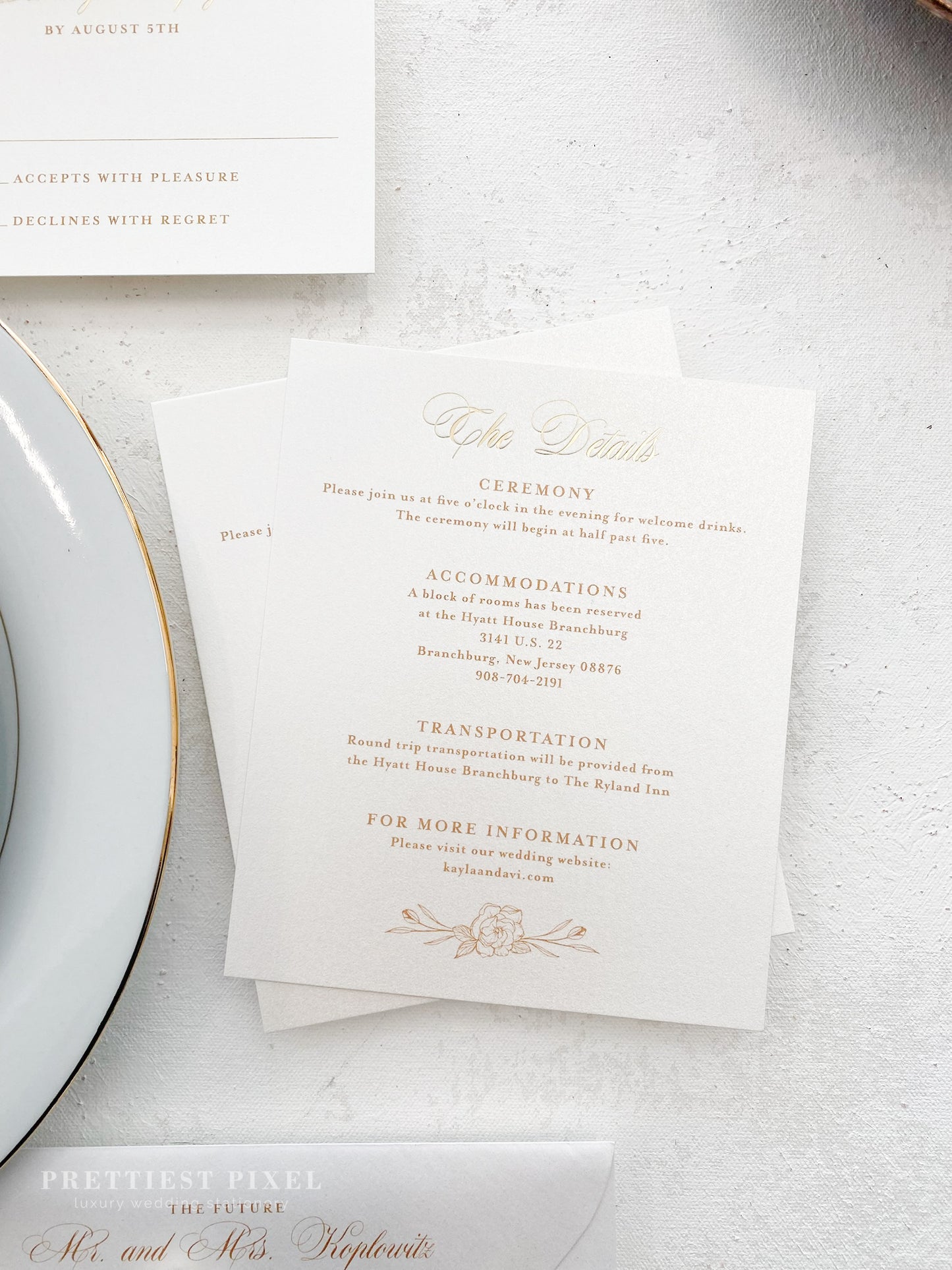 a table topped with a plate of food and a menu