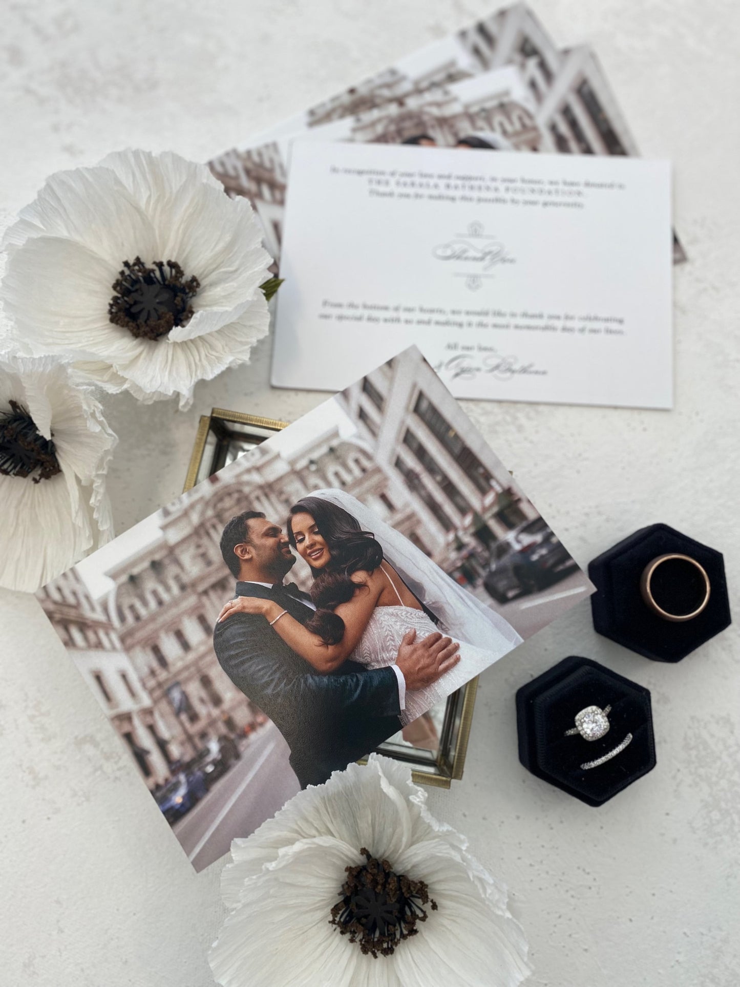 a picture of a couple and their wedding rings