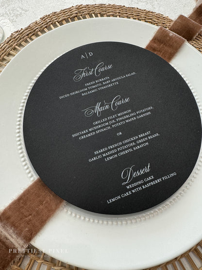 a black and white menu on a white plate