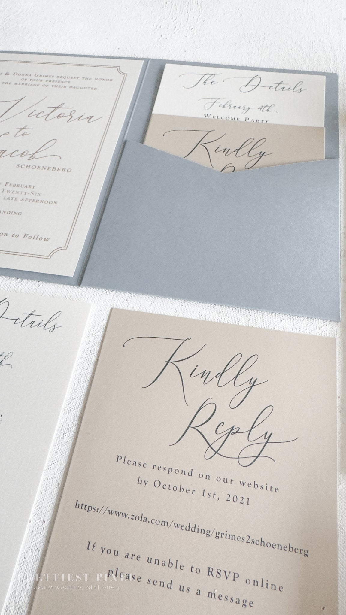 wedding invitation cards with elegant cursive text and a response card for guests to respond to the wedding invitation.