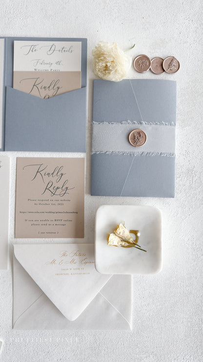 a collection of wedding invitation cards and stationery items arranged on a white background.
