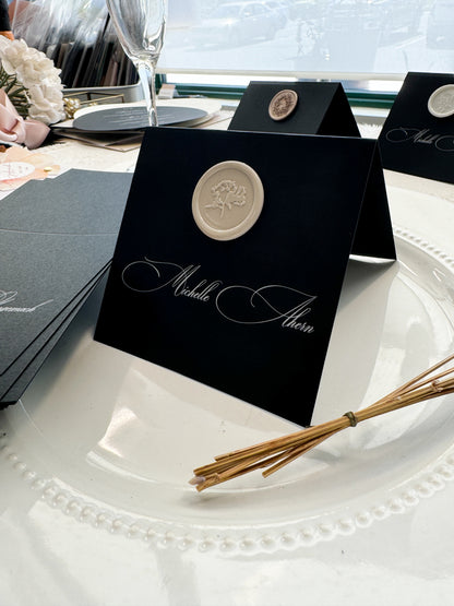 a close up of a plate with a place setting