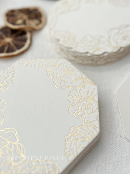 a white table topped with lots of white flowers